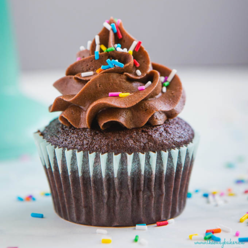a close up of a chocolate cake sitting on top of a table