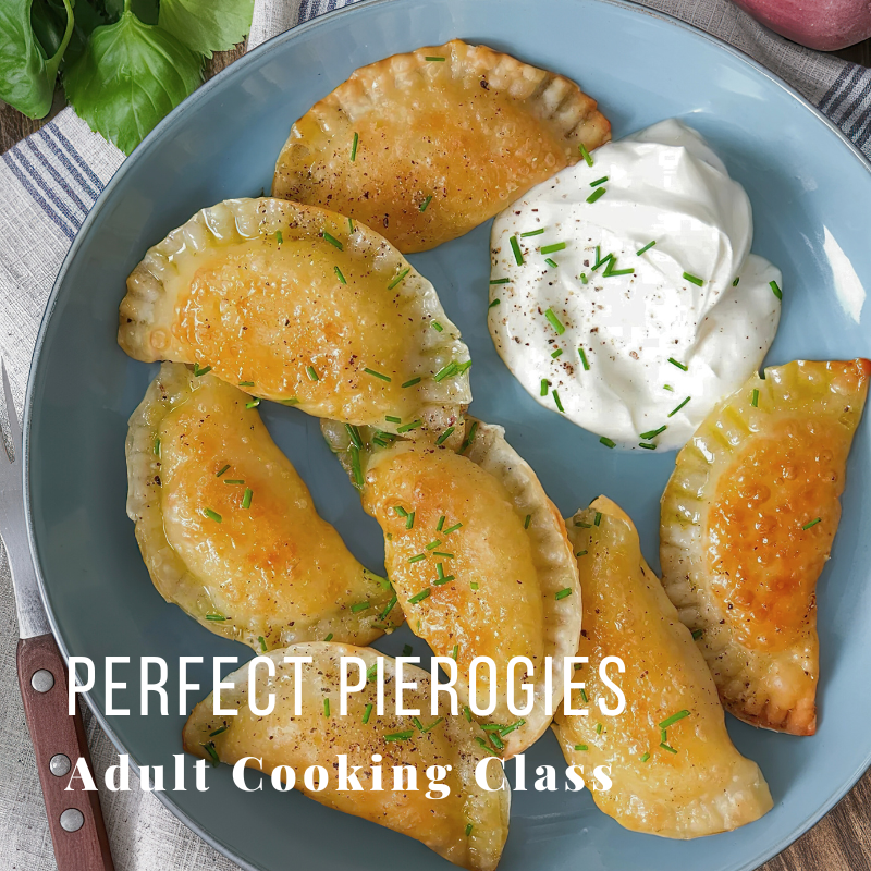 Plate of pierogies with sour cream and herbs. Text: Perfect Pierogies Adult Cooking Class.