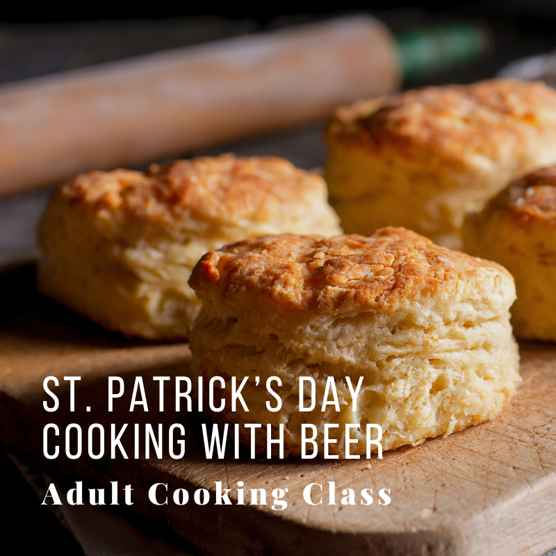 Golden biscuits on a board with text: 'St. Patrick's Day Cooking with Beer, Adult Cooking Class'.
