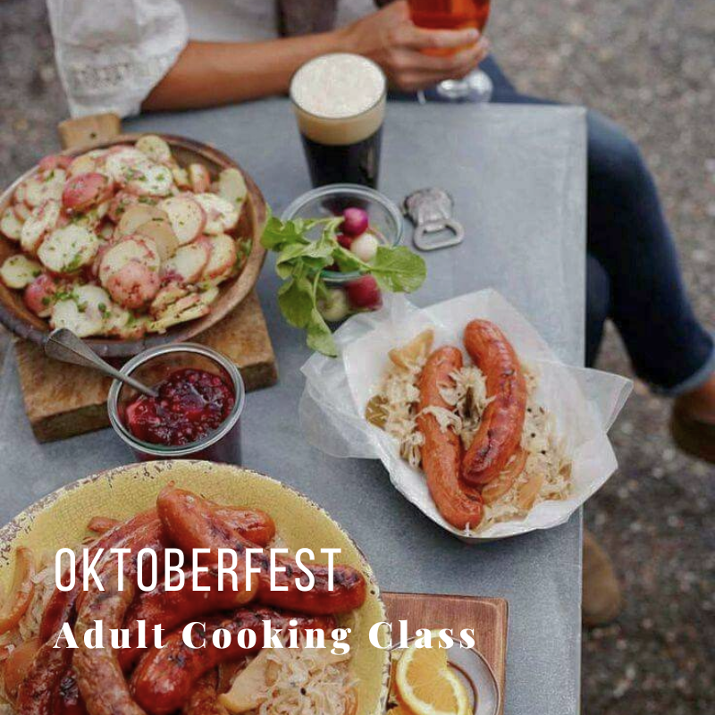 Table with sausages, potatoes, drinks, 'Oktoberfest Adult Cooking Class' text.
