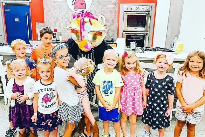 a group of people posing for the camera