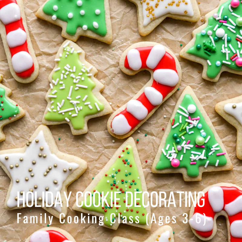 Assorted decorated holiday cookies shaped like trees and candy canes.
