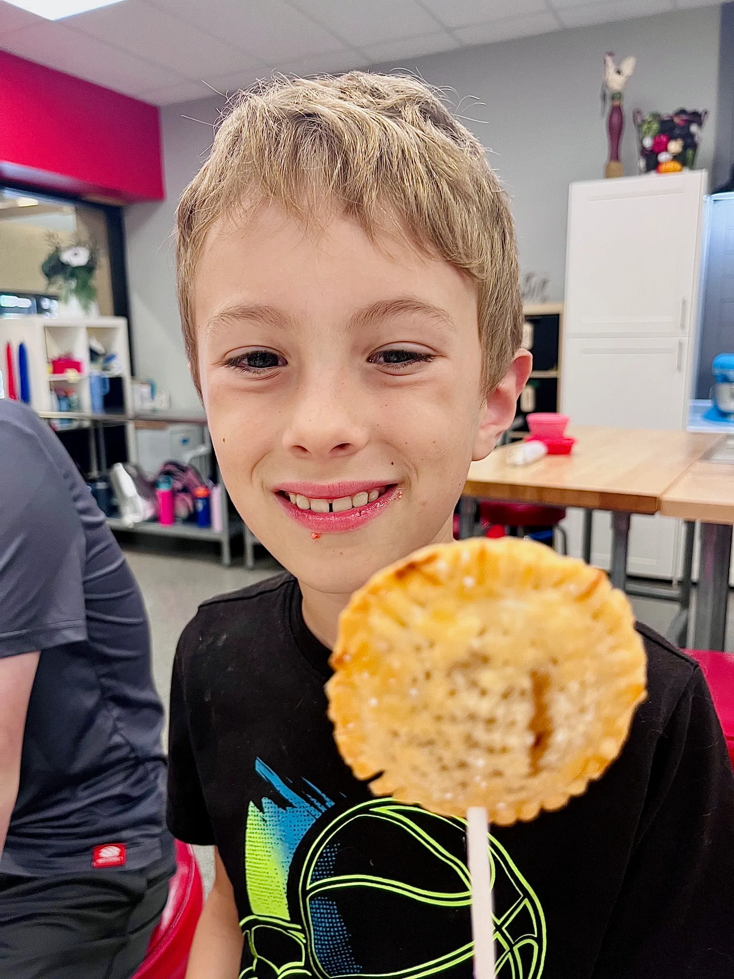 a woman eating a donut