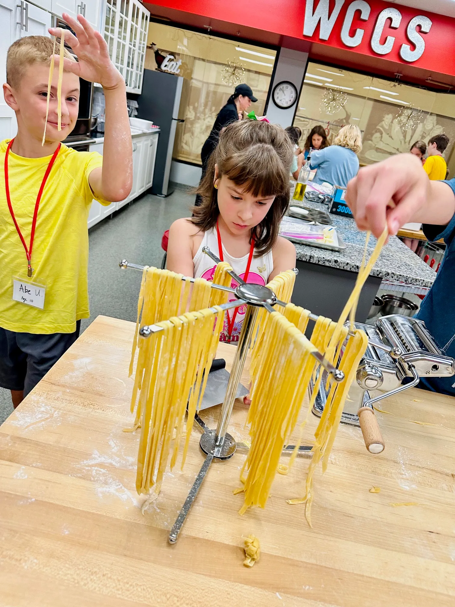 a group of people standing around a bench