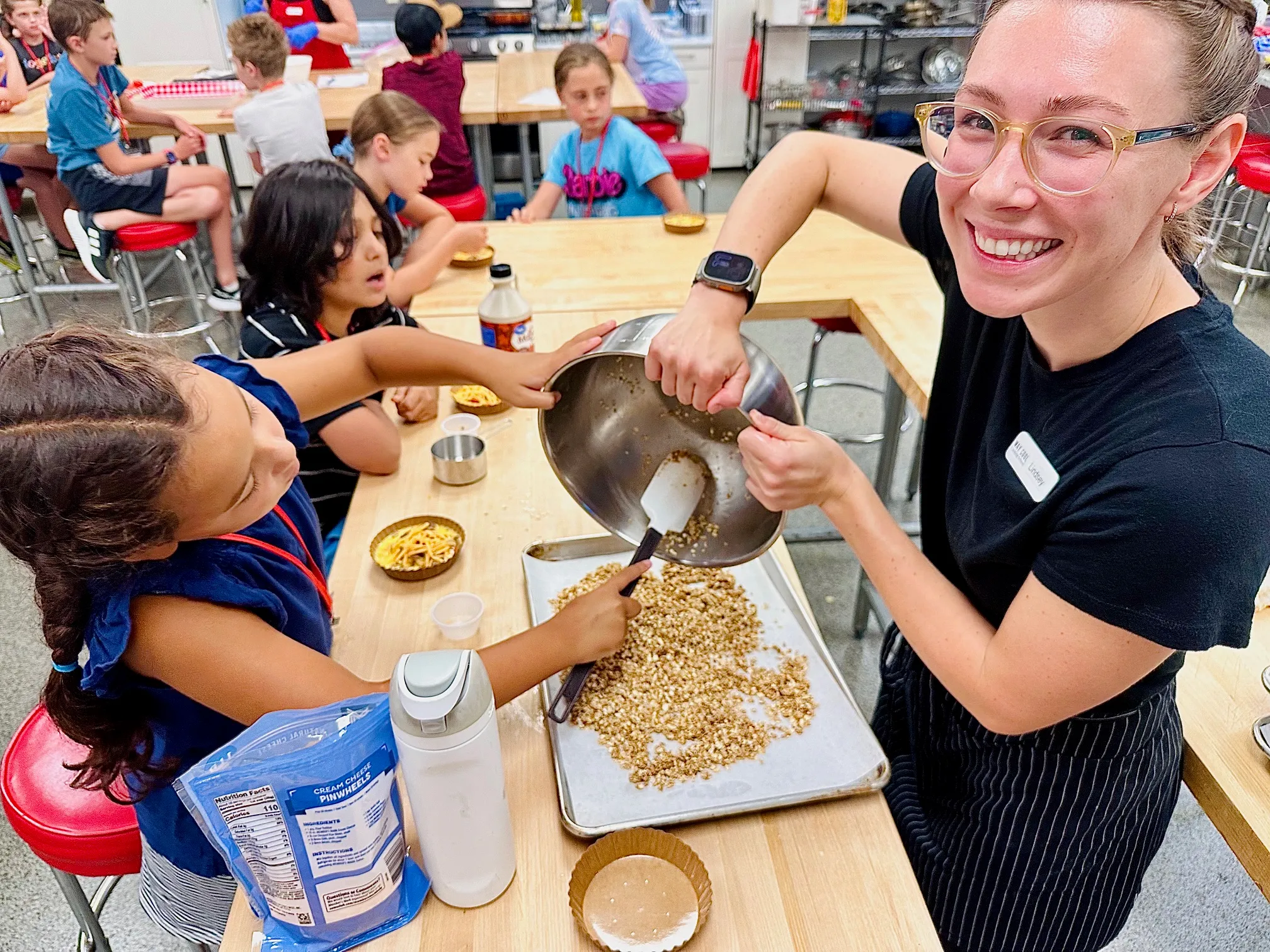 Joanna Worek et al. sitting at a table