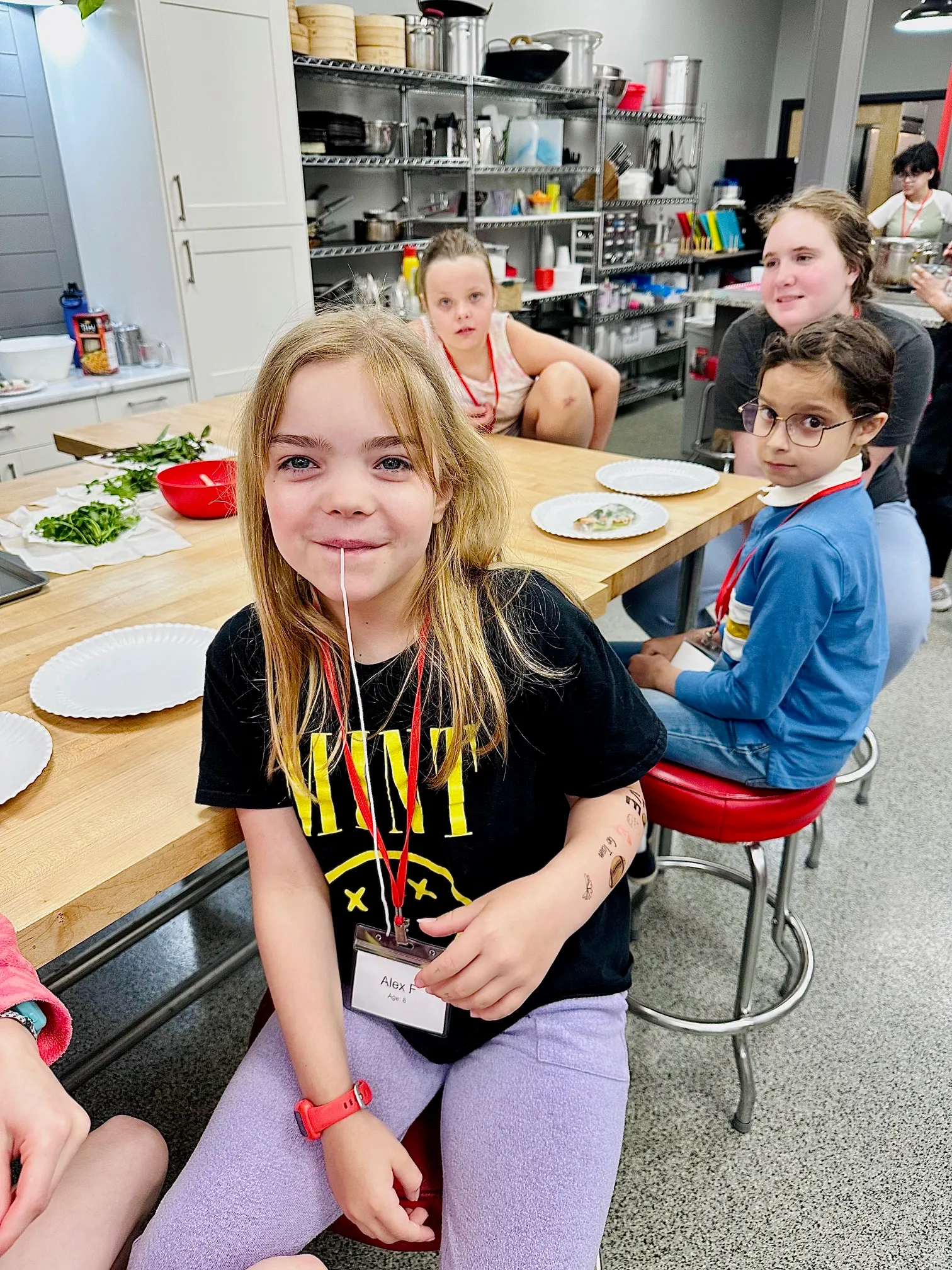 a small child sitting on a table