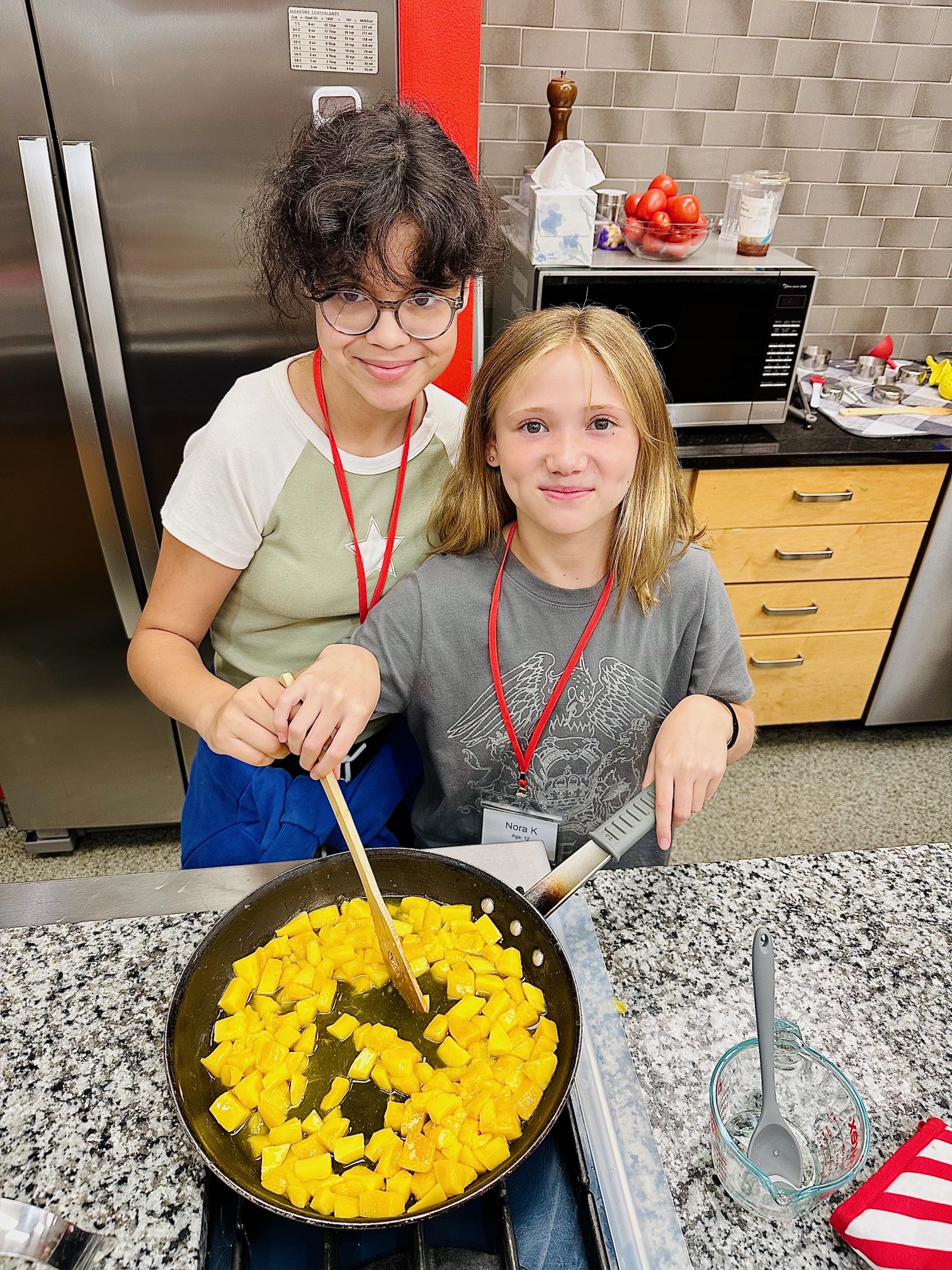a person holding a birthday cake