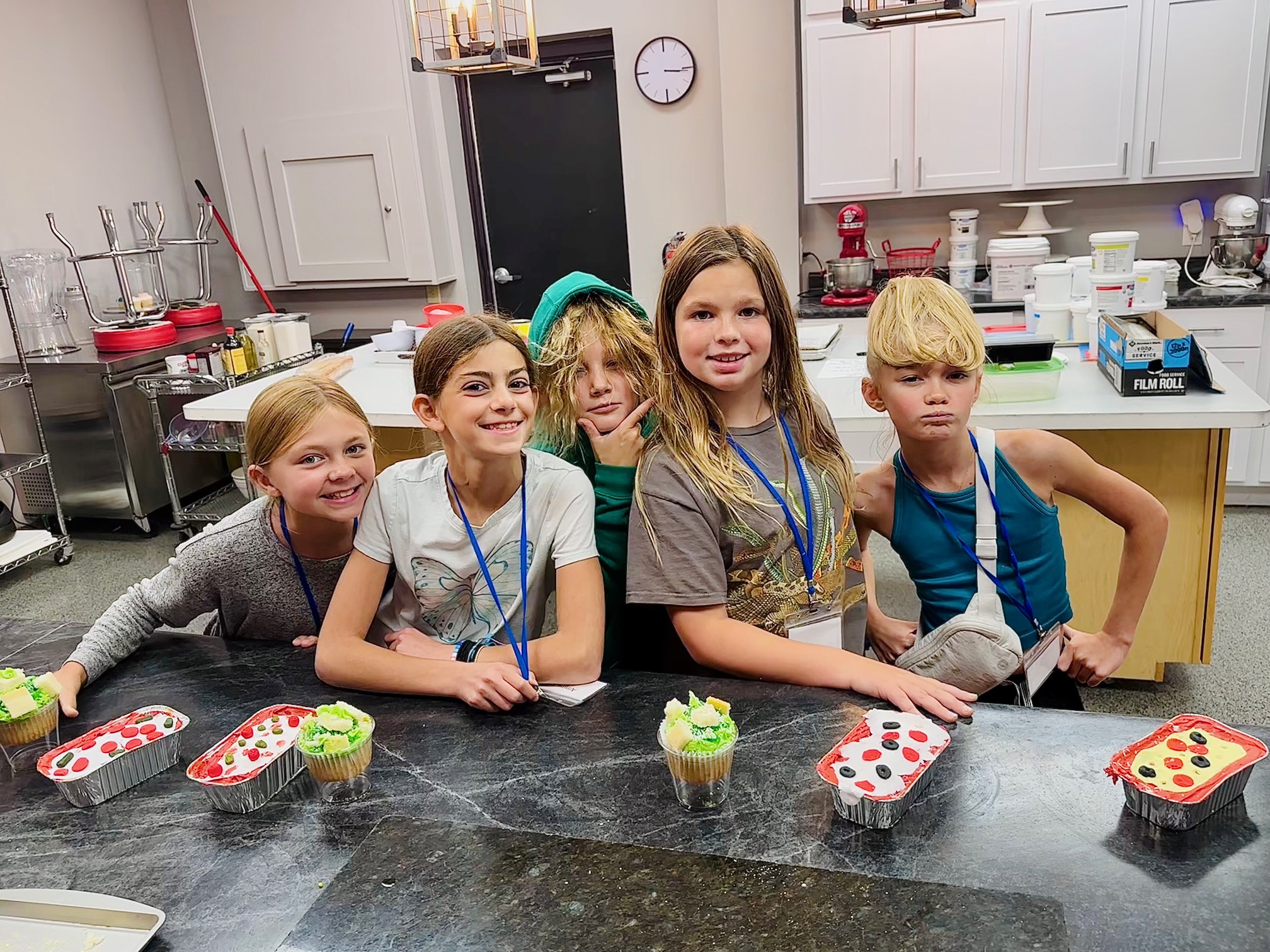a young boy cutting a cake