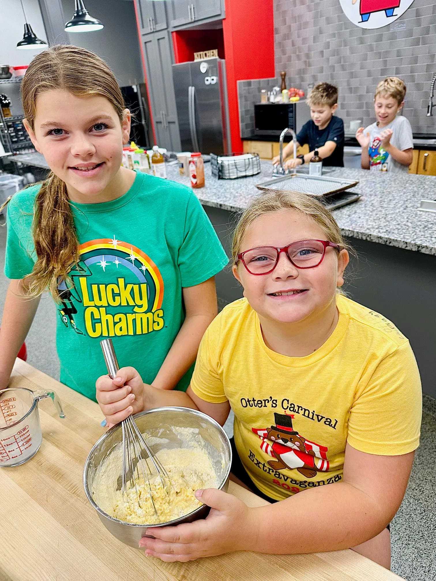 a young boy sitting on a table