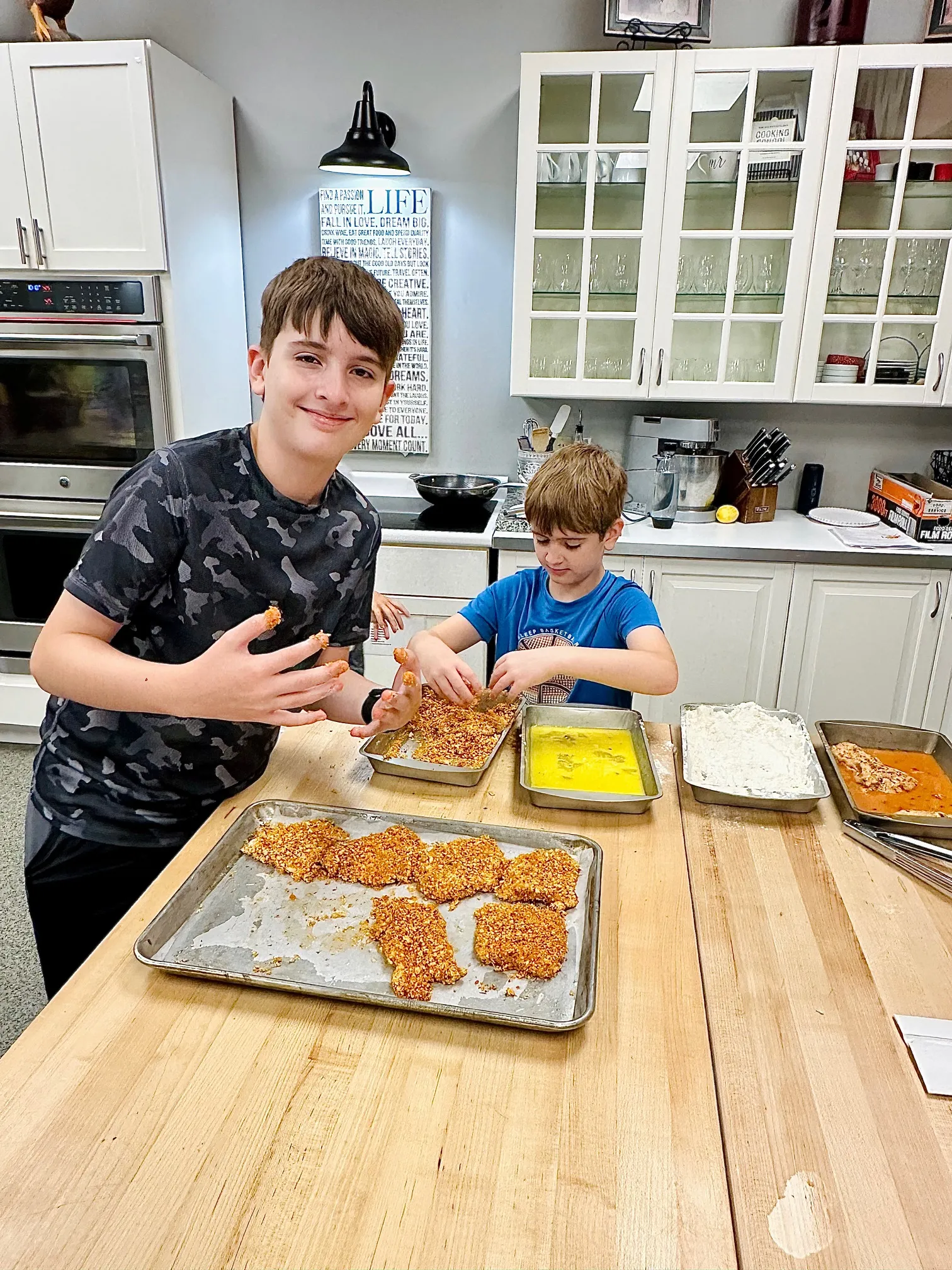 a person sitting at a table with a cake