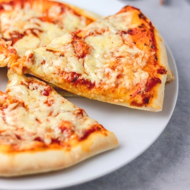 a slice of pizza on a plate