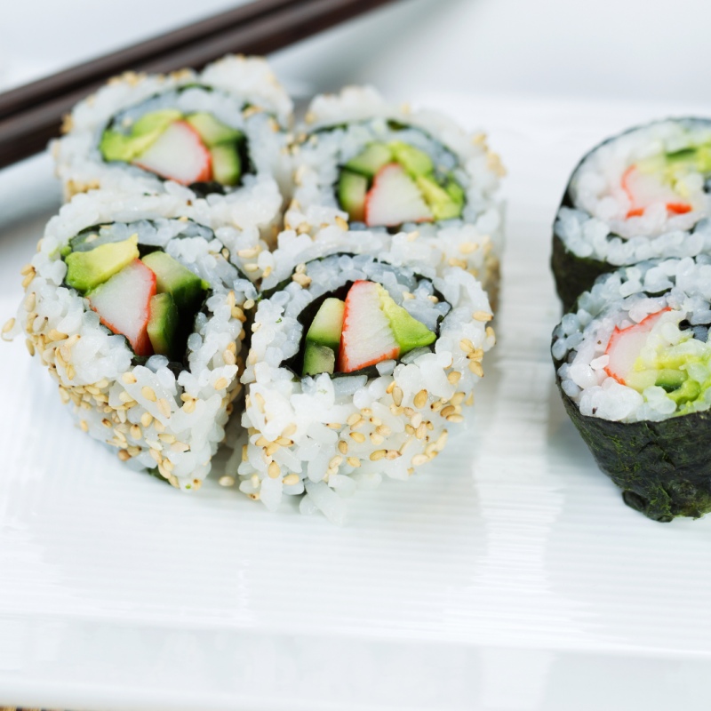 a close up of a plate of sushi