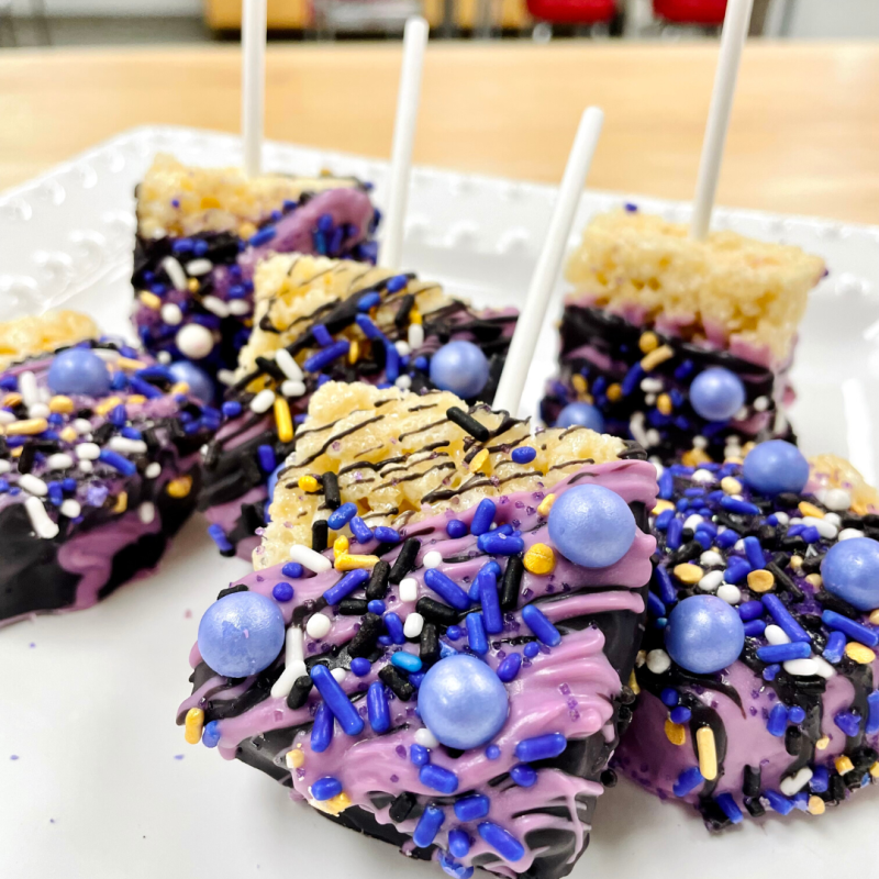 a close up of a plate of birthday cake on a table