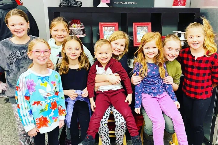 a group of people posing for a photo