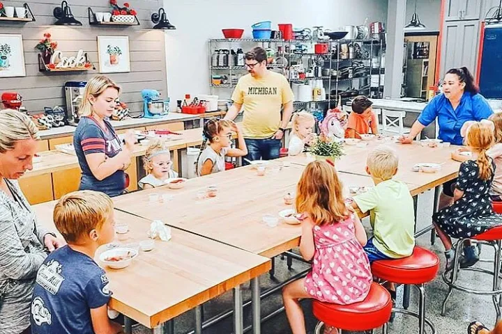 a group of people sitting at a table