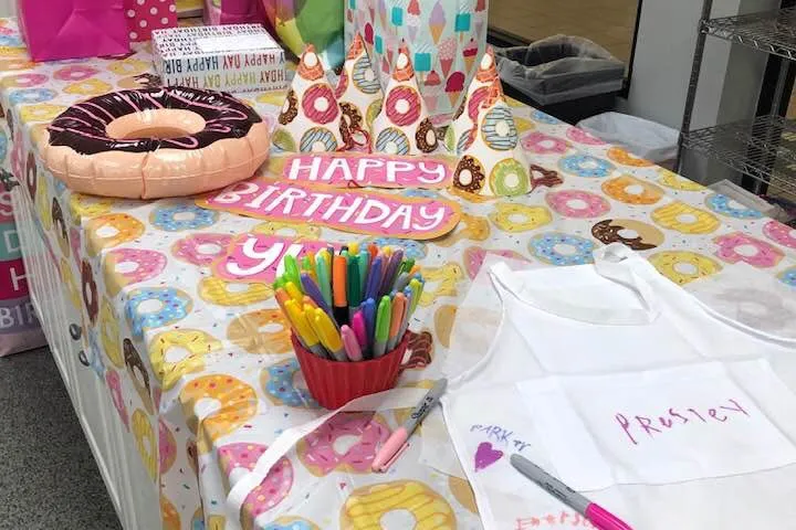 a table with a birthday cake