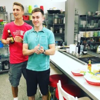 a person standing in a kitchen