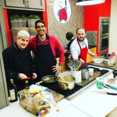 a group of people performing on a counter
