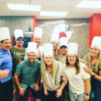 a group of people posing for the camera