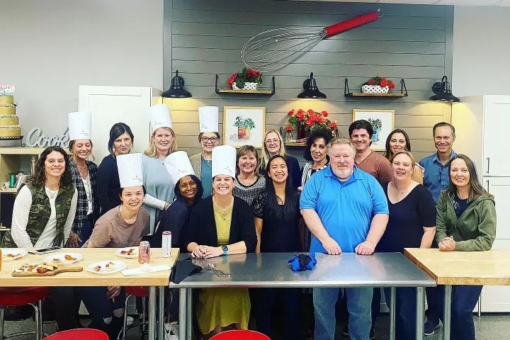 a group of people posing for a photo