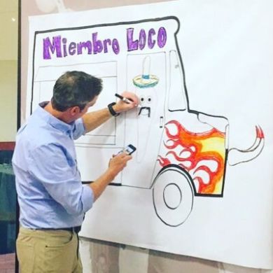 a man standing in front of a building