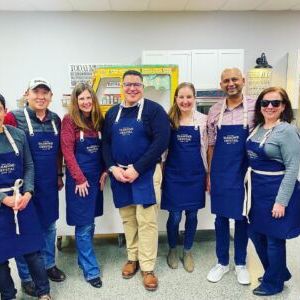 a group of people posing for a photo