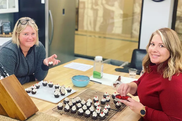 a woman sitting at a table