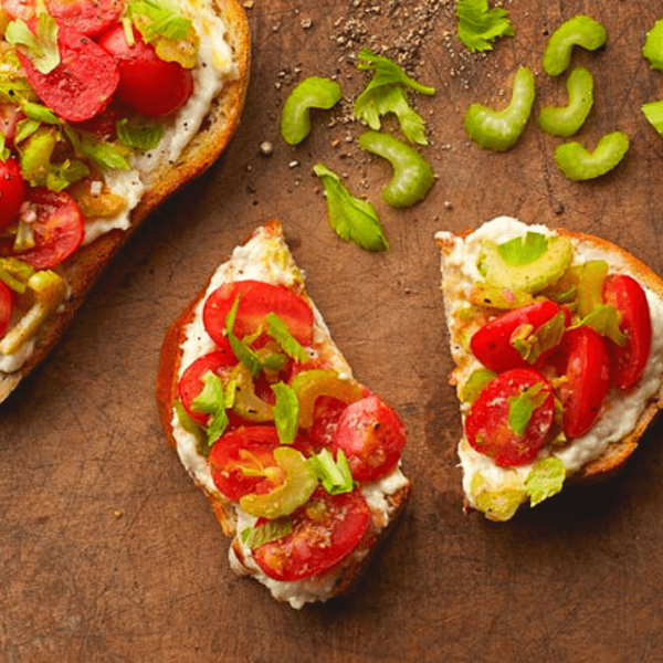 a pizza sitting on top of a cutting board