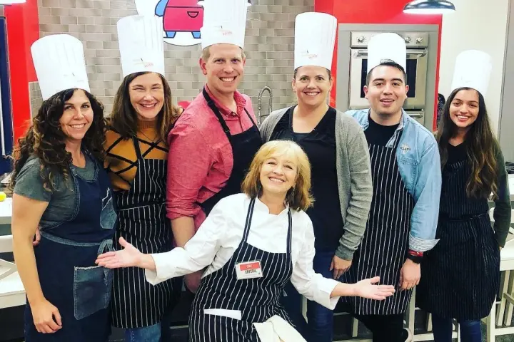 a group of people posing for a photo