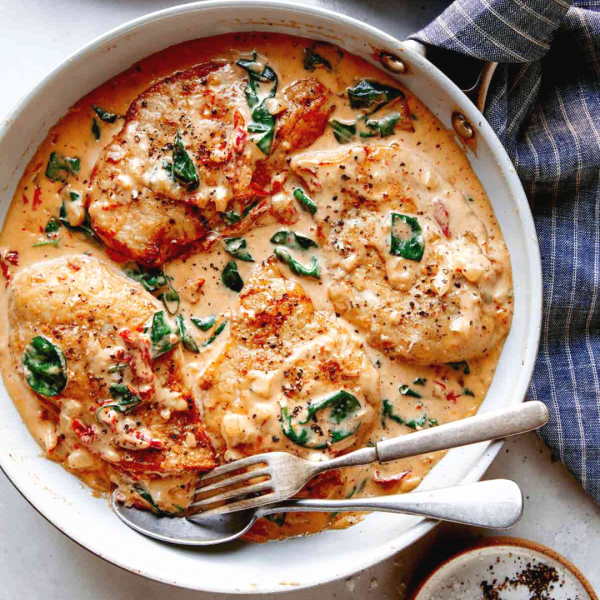 a pizza sitting on top of a plate of food