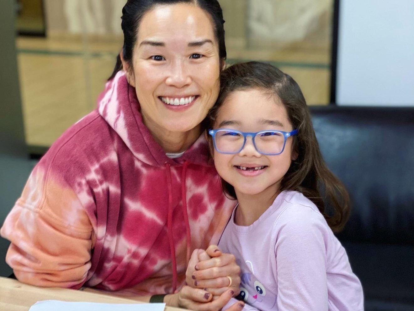 a woman sitting at a table