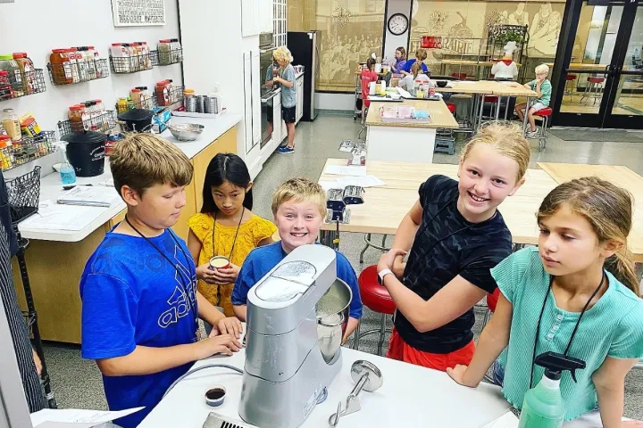 a group of people sitting at a table