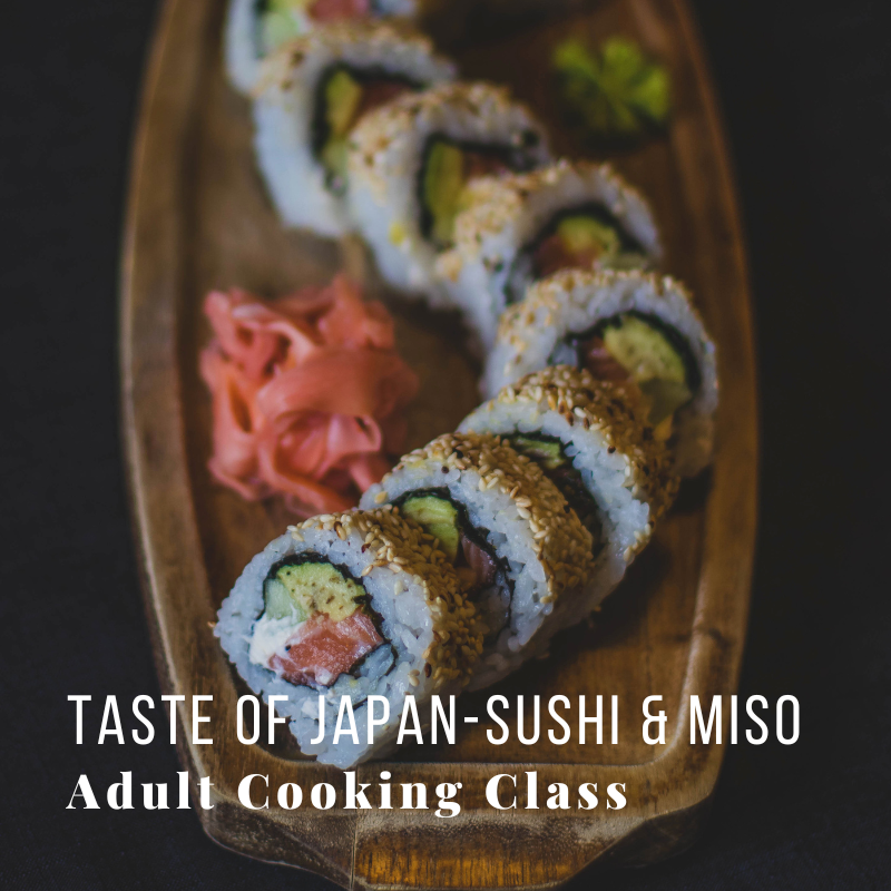 Sushi rolls on wooden board with 'Taste of Japan-Sushi & Miso' text.
